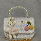 Miniature Beaded Handbag with Plush Bunny